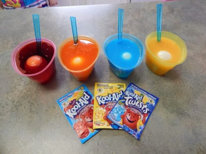 kool-aid dyed easter eggs in cups