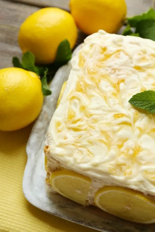 a sweet and tart lemon poke cake is a refreshing summer dessert