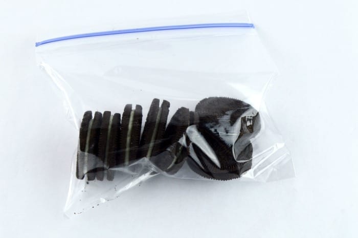 Crush up Oreos in a plastic bag