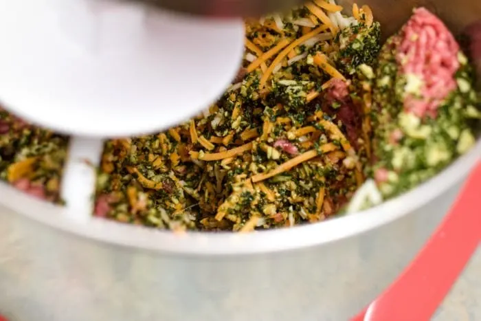 mixing up ingredients for kale meatloaf