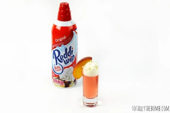 peach jello shot with Reddi-wip