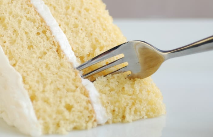cutting into cake