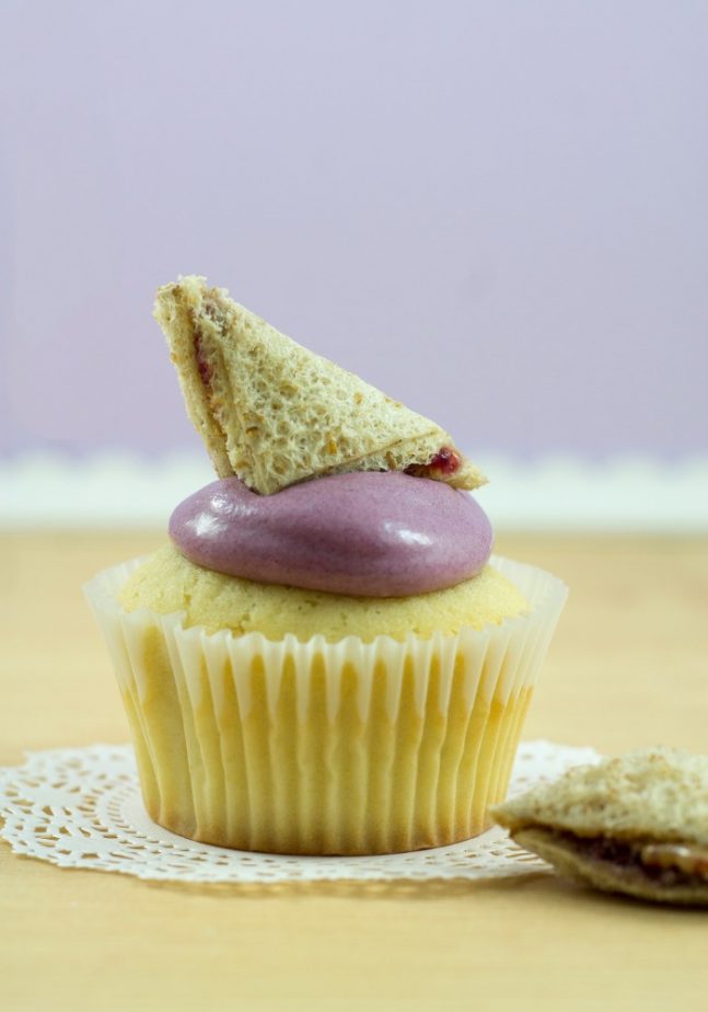 These deliciously classic peanut butter & jelly cupcakes will give you all that taste you remember, without the crusts. Enjoy! | #TotallyTheBomb #pbj #sandwich #lunch #classic #traditional #childhood #dessert #nocrusts