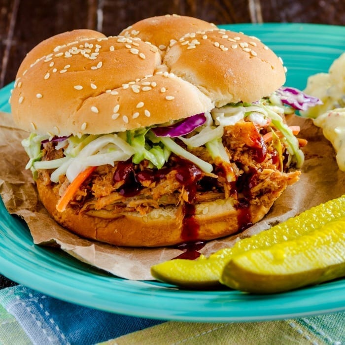 This delicious, tangy, fruity 3-ingredient Instant Pot barbecue pulled pork tastes like old fashioned southern home cooking, but none of that waiting all day. | #TotallyTheBomb #InstantPot #PulledPork #3Ingredient #Recipe #BBQ #FastFood