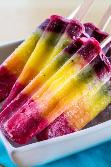 One of my favorite ways to trick my kids into eating veggies is these Magical Hidden Veggie Rainbow Popsicles. #hiddenveggies #popsicle