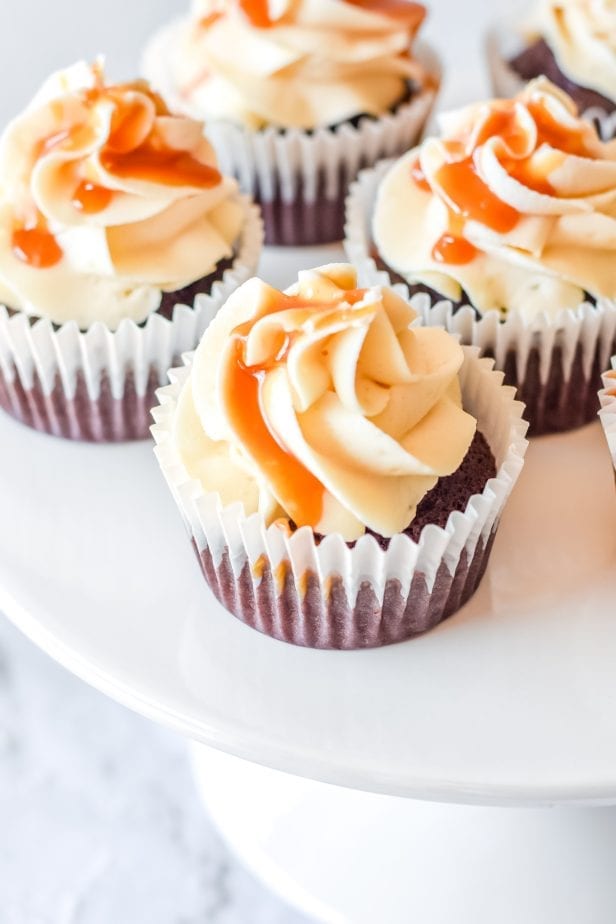 If you were hoping for a classic death-by-dessert, let me assure you that these decadent and creamy Salted Caramel Cupcakes deliver. #saltedcaramel #saltedcaramelcake #saltedcaramelcupckes #caramel