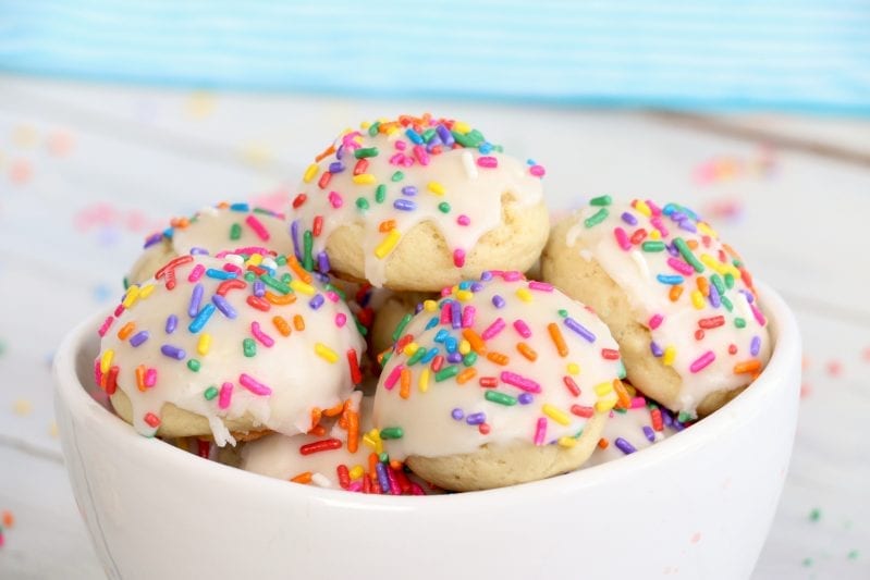 So soft and chewy, these Confetti Cookies are so ridiculously good, my mouth is watering for another taste. #confetticookies #cookies #cookierecipes #springcookies