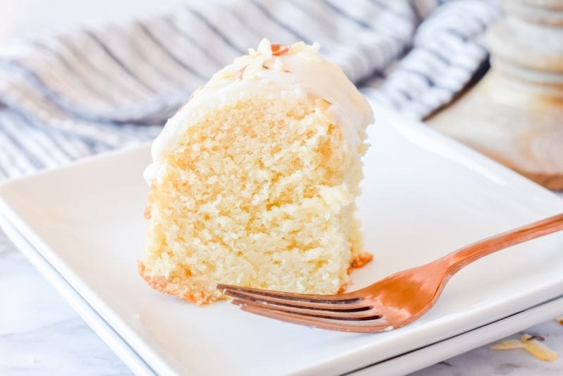 I'm in Love with this Almond Bundt Cake. It's so simple and such an easy cake to make--and it turns out soft and fluffy every time. So good. #cake #almondbundtcake #bundtcake #almondcake
