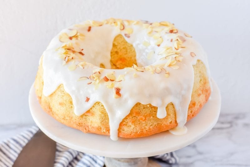 I'm in Love with this Almond Bundt Cake. It's so simple and such an easy cake to make--and it turns out soft and fluffy every time. So good. #cake #almondbundtcake #bundtcake #almondcake