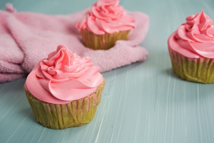 I am not kidding, for a little girl's night-in, these Boozy Strawberry Cupcakes are so perfect. I die. #boozycupcake #drunkcupcake #strawberrycupcake #cupcake