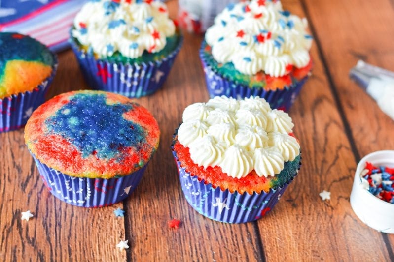 If you're thinking about the big July 4th BBQ you're going to throw, these Patriotic Cupcakes are the Perfect July 4th Dessert. They're super easy and fun to make--and they taste like a million bucks. #july4th #july4thdesserts #patrioticdesserts