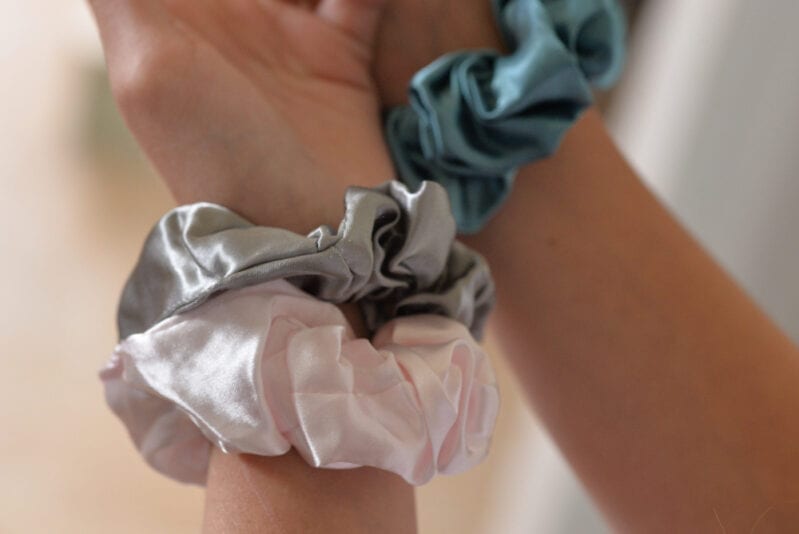 Here's Why All The Boys Are Wearing Scrunchies Around Their Wrists
