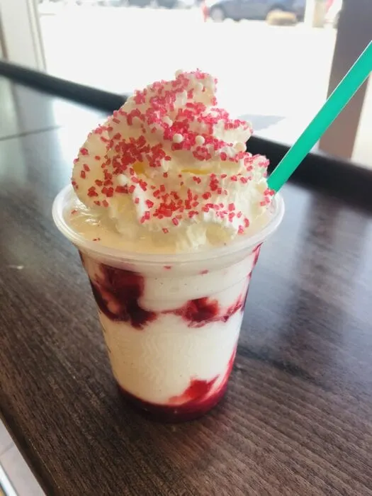 a sweet strawberries and cream drink is a fun and festive Santa Claus Frappuccino from starbucks