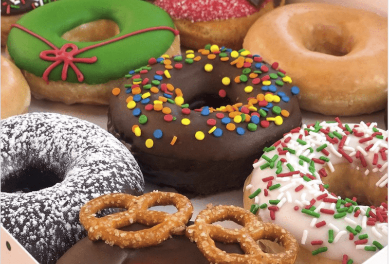 Krispy Kreme Doughnuts Are  Buy A Dozen, Get A Dozen For $1 Tomorrow