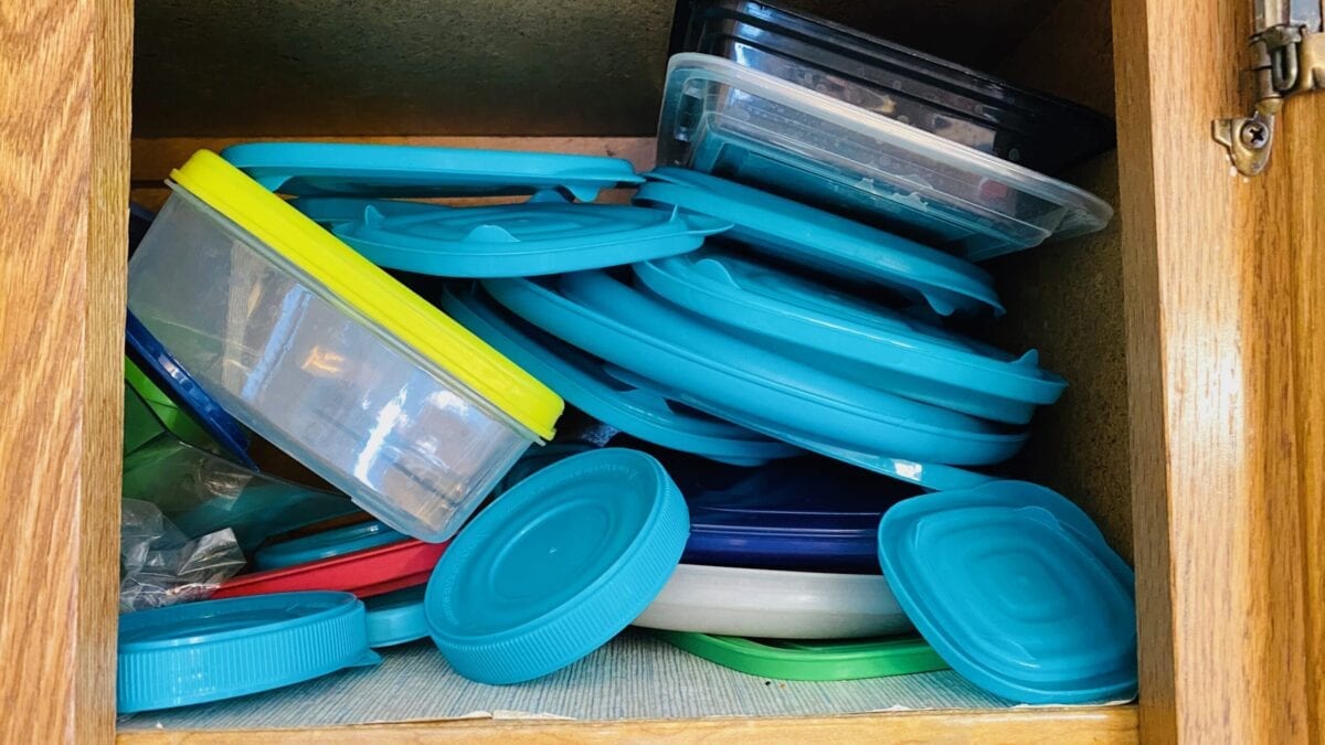 This Kitchen Drawer Hack Finally Gives You A Place to Store All Those Tupperware Lids