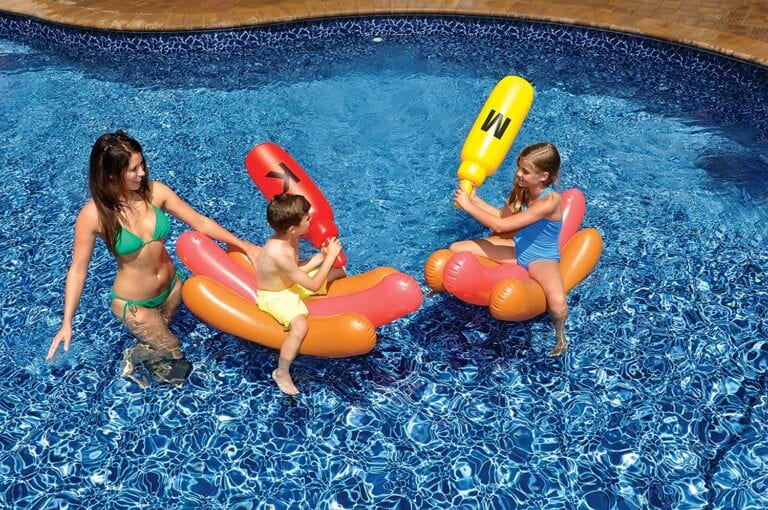 These Inflatable Hot Dogs and Condiment Bottles Allow You To Play The Chicken Fight Game In Your Pool