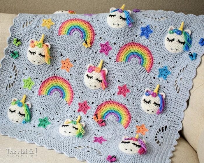 Crocheted Unicorn Blanket with rainbows and stars