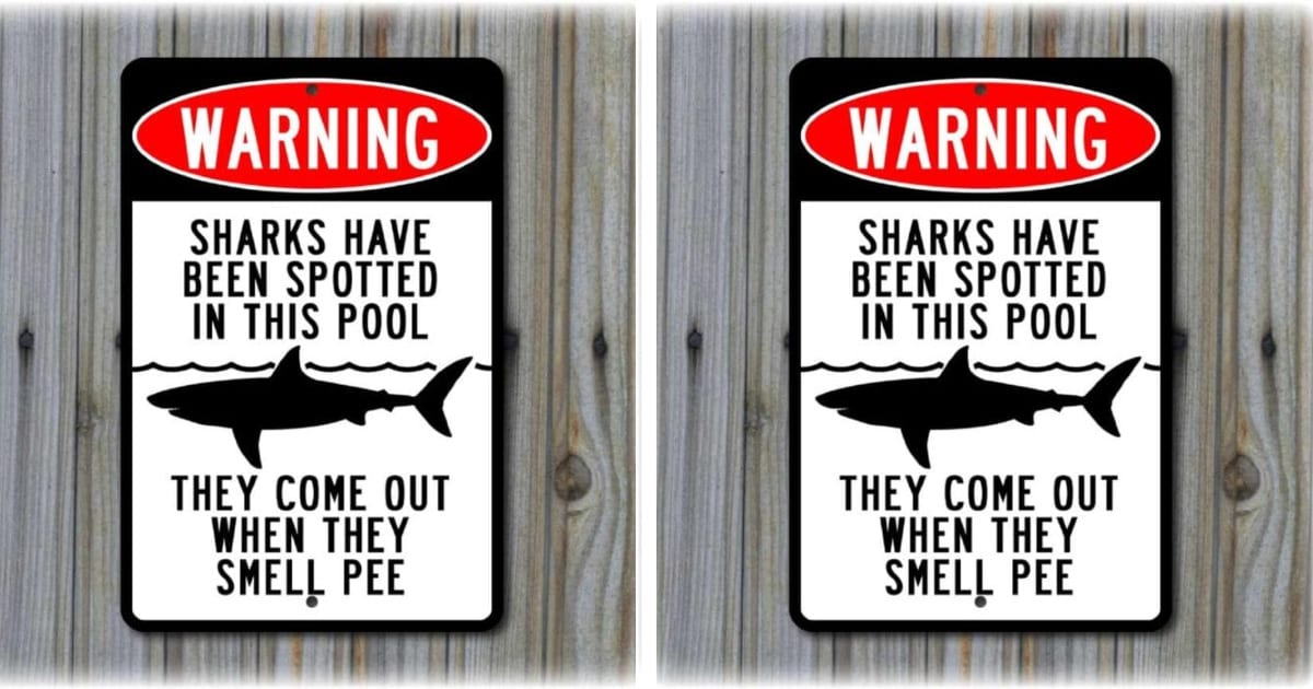 This Shark Sign Is The Funniest Way To Keep The Pee Out Of Your Pool This Summer