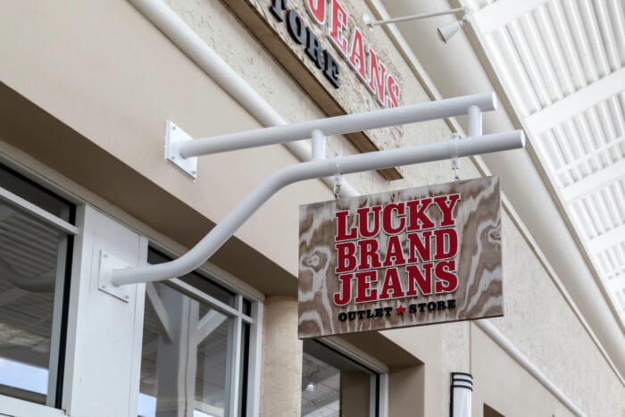 Lucky Brand headquarters  Logo sign, Lucky brand, ? logo