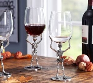 Pottery Barn Is Selling Wine Glasses That Are Held Up By Mini Skeletons