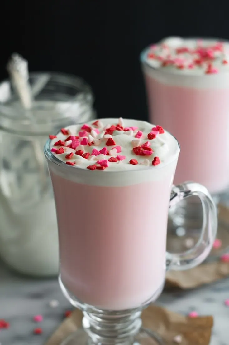 https://cdn.totallythebomb.com/wp-content/uploads/2020/11/pink-hot-chocolate-mason-jar-whipped-cream-image-feature-735x1105.jpg.webp