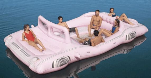 This 21-Foot Retro Pink Limo Float Is The Perfect Way To Spend Your Day On The Water
