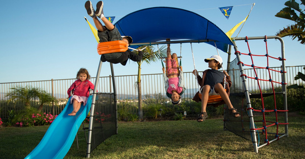 You Can Get A Swing Set For Your Kids That Has A Water-Mist Spray System To Keep Them Cool While Playing