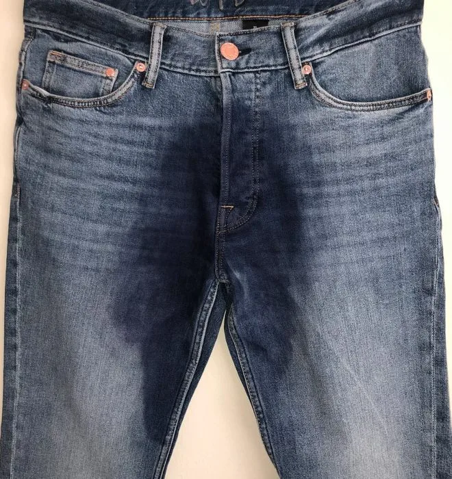 Wet Pants Denim stained-crotch jeans.