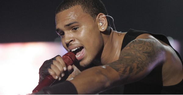 Police Say Chris Brown is Accused Of Hitting A Woman So Hard, It Knock Her Weave Out