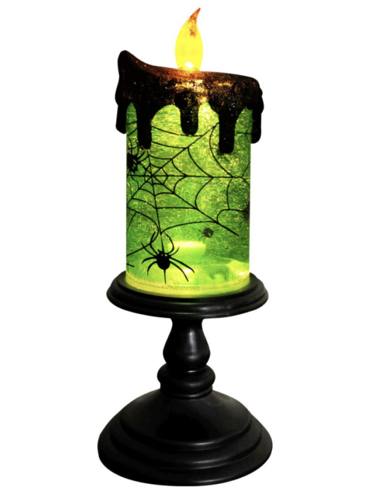 This Spinning Green Witches' Candle Light Illuminates At Night For A