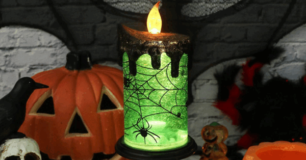 This Spinning Green Witches’ Candle Light Illuminates At Night For A Spooky Halloween Glow