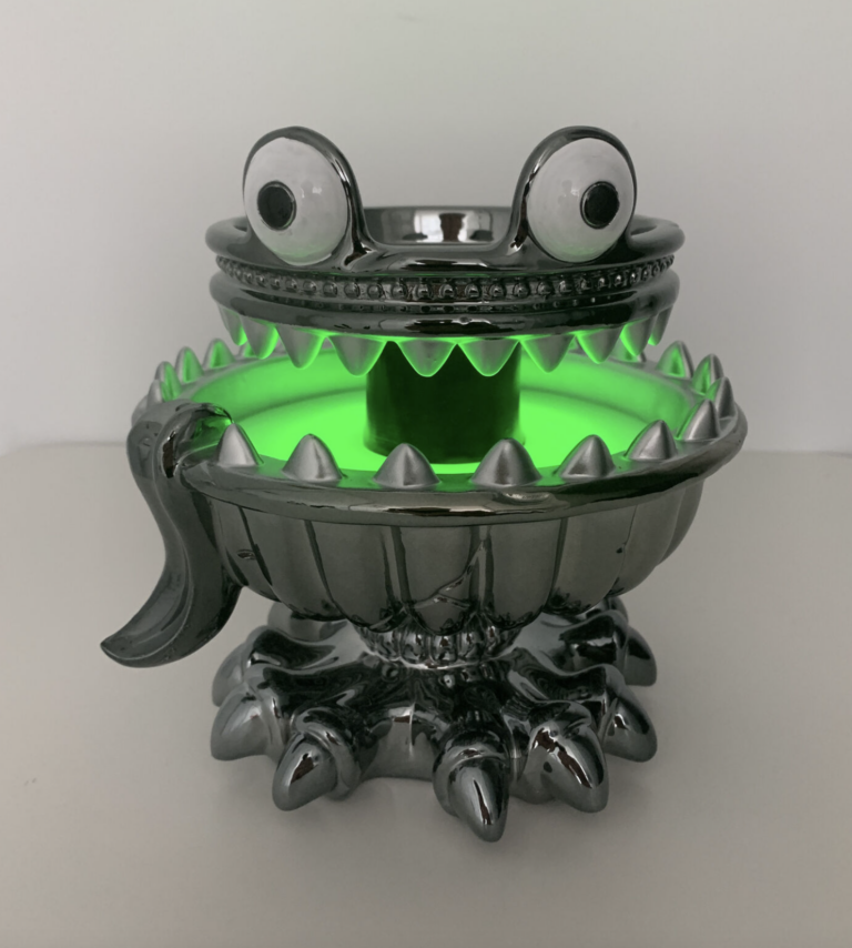 Bath & Body Works Has A Neon Green Glowing Monster Candle Holder Just