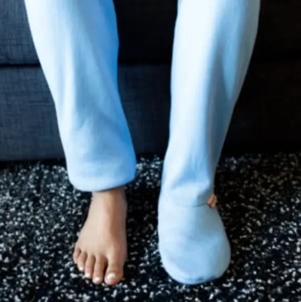 These Adult Footie Sweatpants Keep Your Feet Toasty Warm