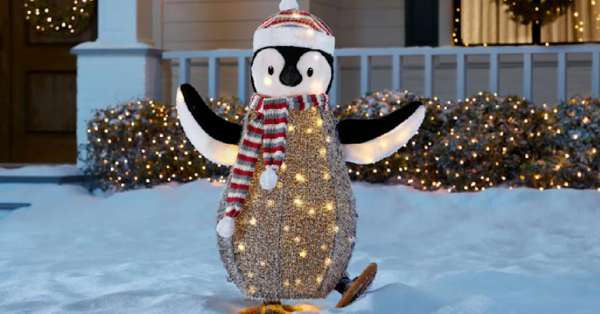 Home Depot Is Selling A Light-Up Skating Penguin You Can Put In Your Yard For The Holidays