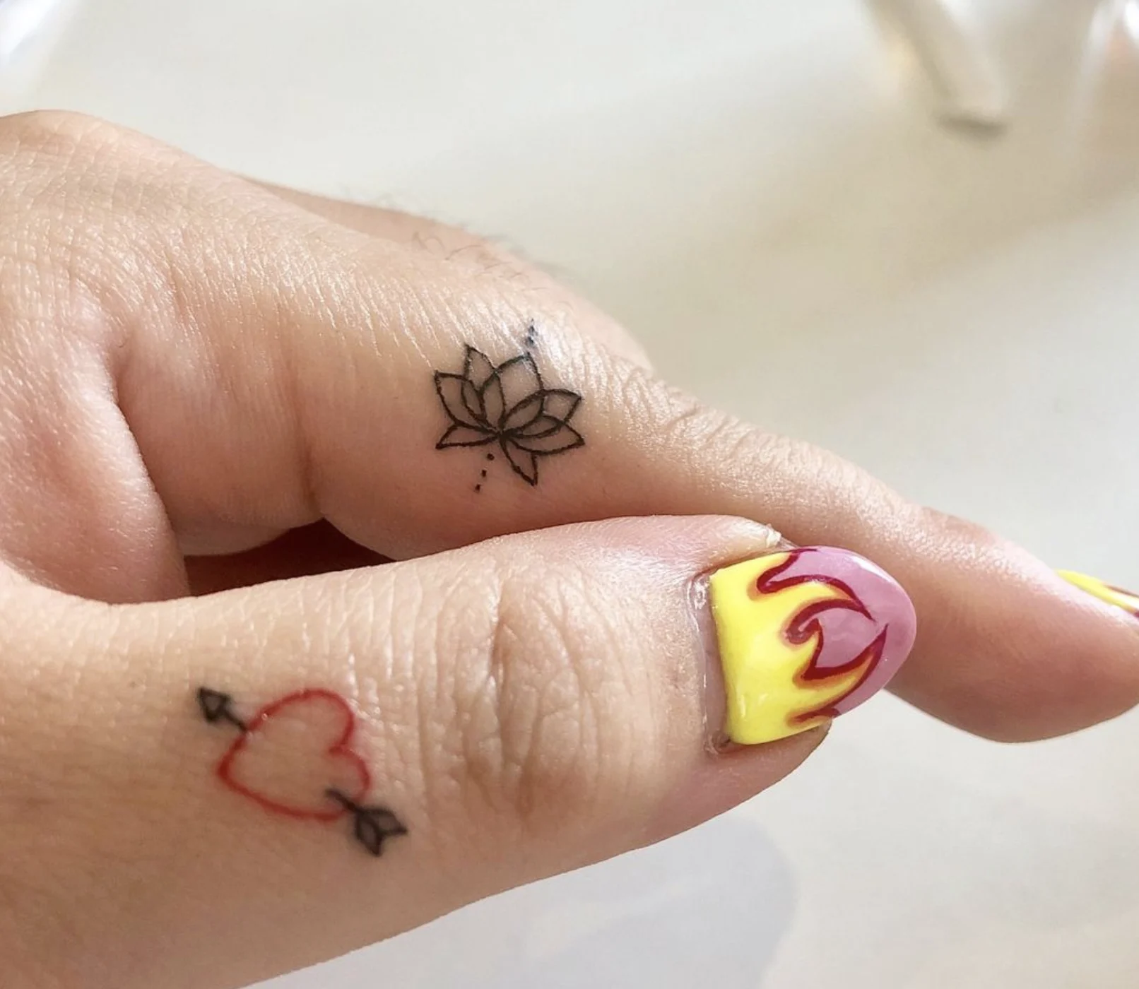22 Fabulous Finger Tattoos  Peanut