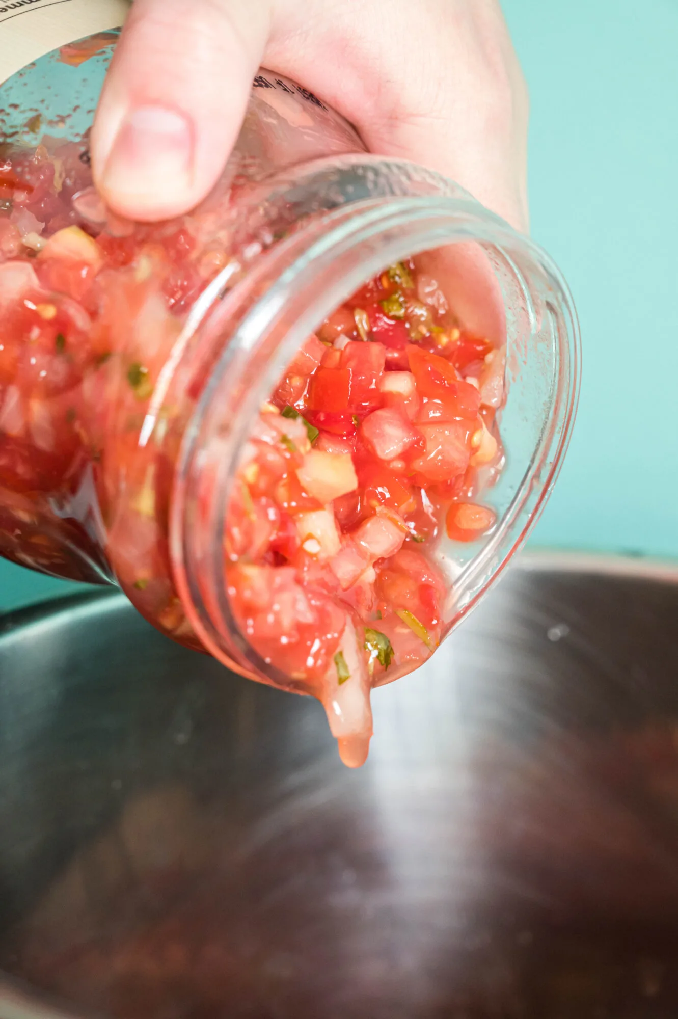 salsa being poured into instant pot