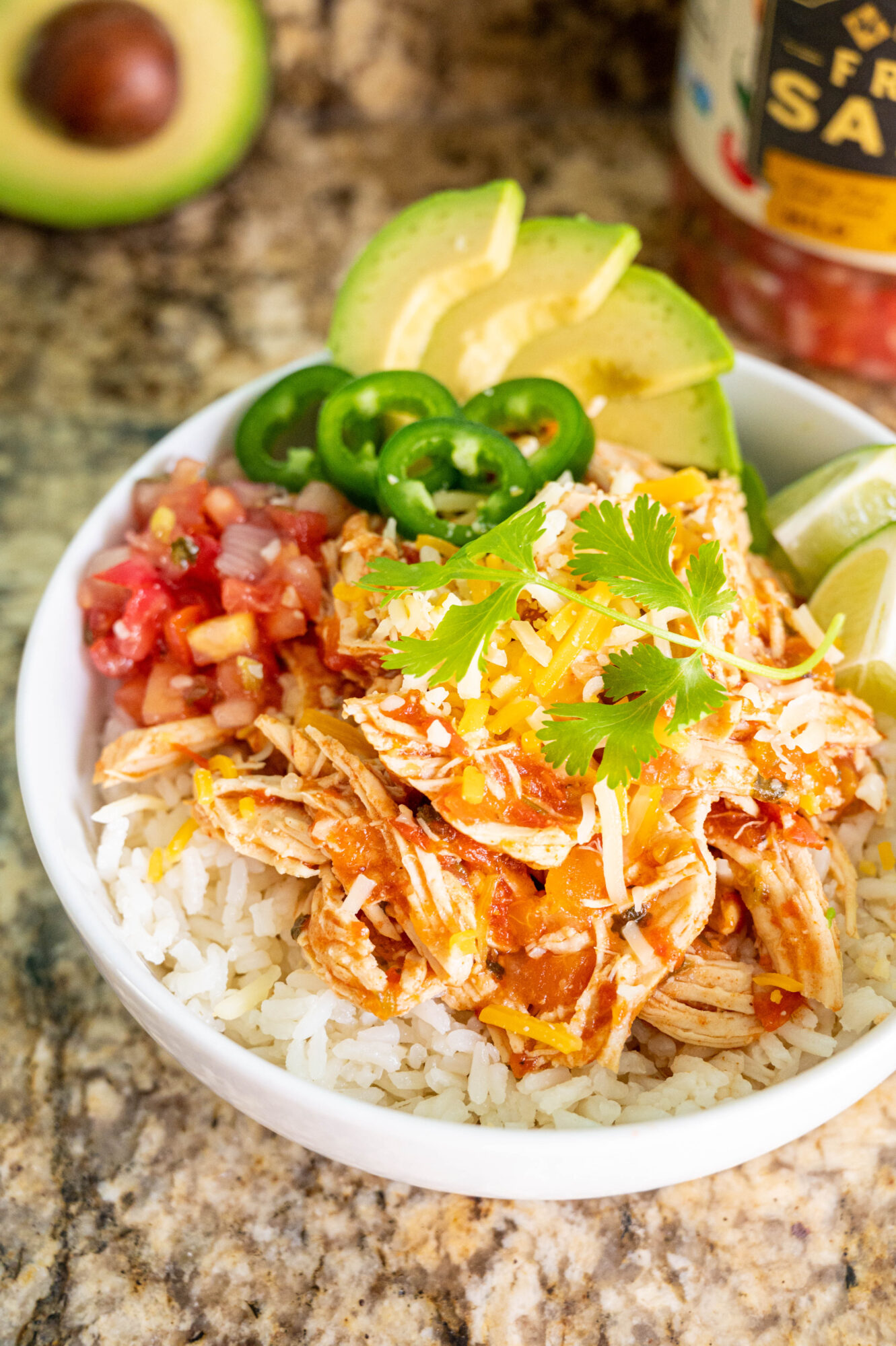loaded salsa chicken rice bowl on counter