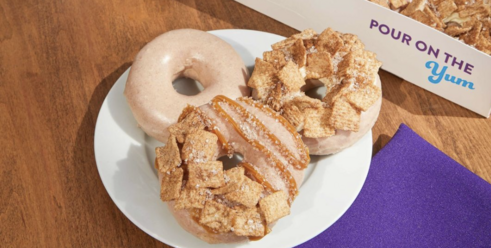 Krispy Kreme Releases Donuts Covered In Cinnamon Milk Glaze and Topped with Cinnamon Toast Crunch Pieces