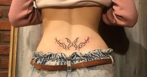 Ice Spice's 'Tramp Stamp' Tattoo Leaves Fans Thirsting Over Her | HipHopDX