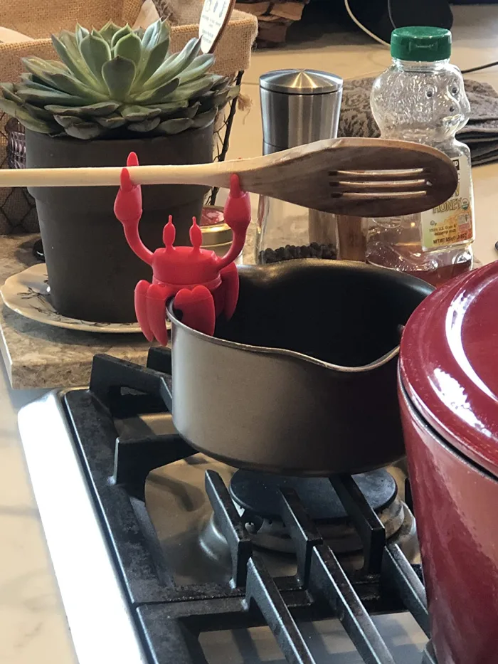 A Crab Spoon Rest That Looks Like It's Cheering You On And 33
