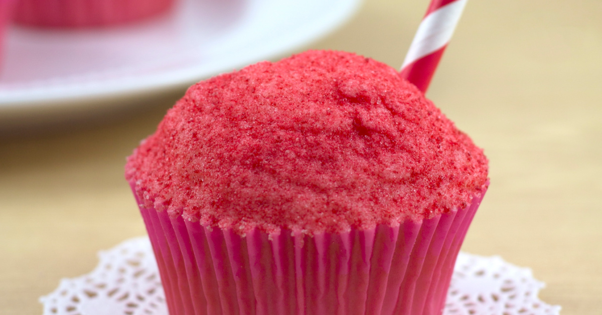 up close of snow cone cupcake with pink wrapper